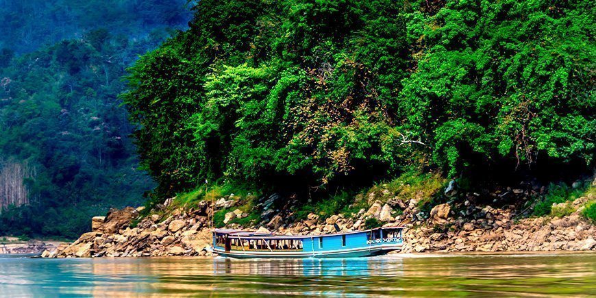 Cruisebåd på Mekong-floden